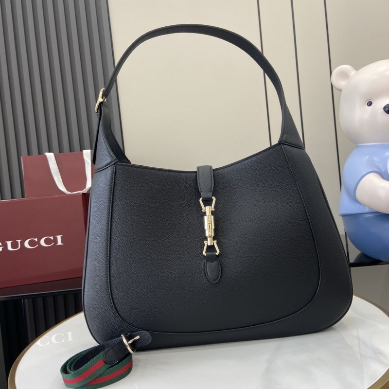 G*u*i top handle bags
